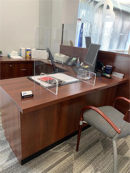 Image of Virus/Sneeze Guard placed on desk